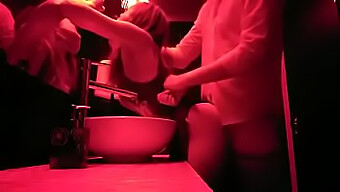 Gay Men Engage In Sexual Activity In A Club Bathroom