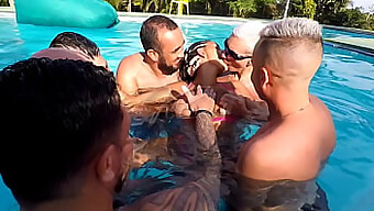 A Stunning Brunette Joins A Gangbang With Multiple Participants